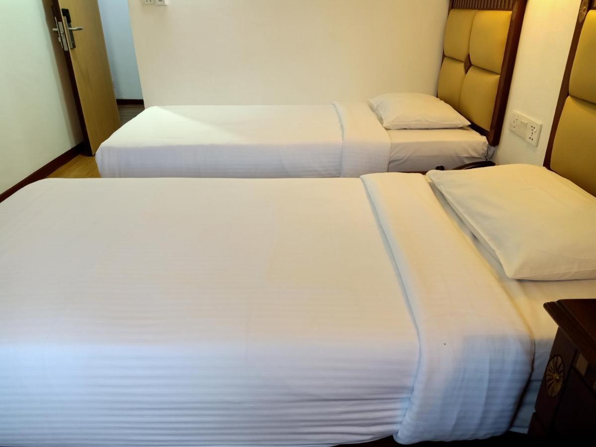 Super Oyo 90464 Borneo Suites Hotel Кота-Кинабалу Экстерьер фото