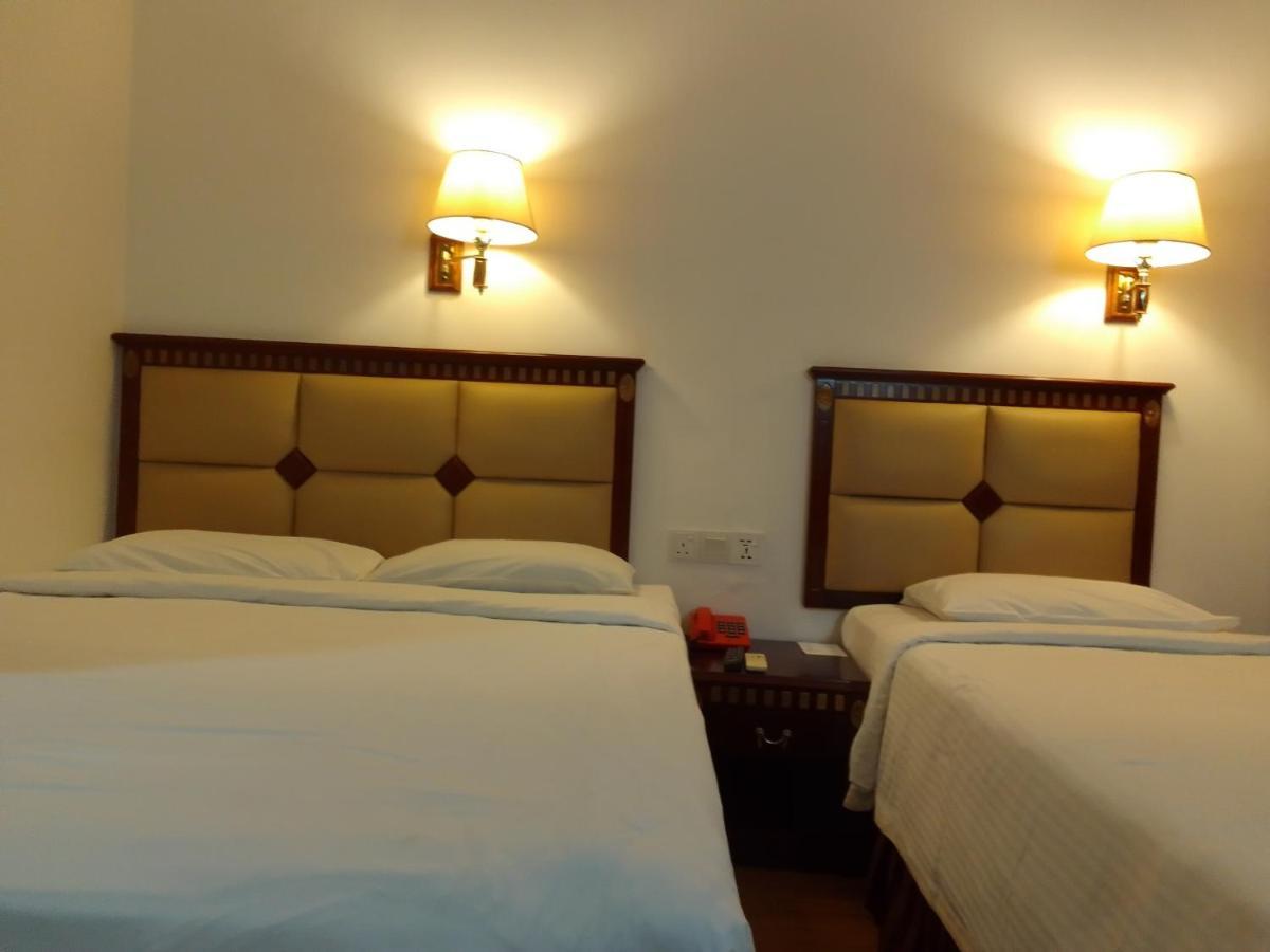 Super Oyo 90464 Borneo Suites Hotel Кота-Кинабалу Экстерьер фото