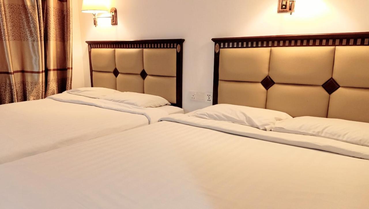 Super Oyo 90464 Borneo Suites Hotel Кота-Кинабалу Экстерьер фото