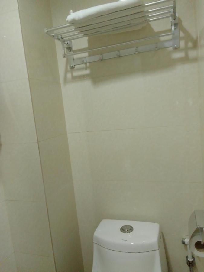 Super Oyo 90464 Borneo Suites Hotel Кота-Кинабалу Экстерьер фото