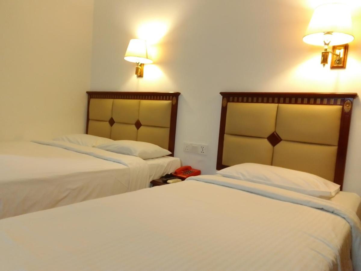 Super Oyo 90464 Borneo Suites Hotel Кота-Кинабалу Экстерьер фото