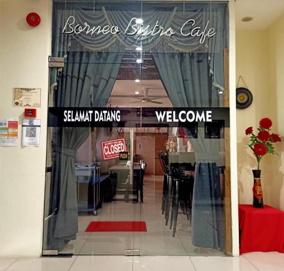 Super Oyo 90464 Borneo Suites Hotel Кота-Кинабалу Экстерьер фото