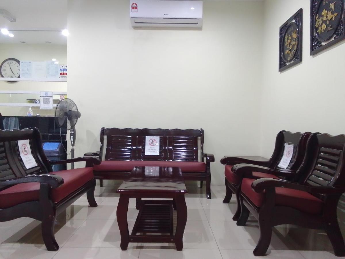 Super Oyo 90464 Borneo Suites Hotel Кота-Кинабалу Экстерьер фото