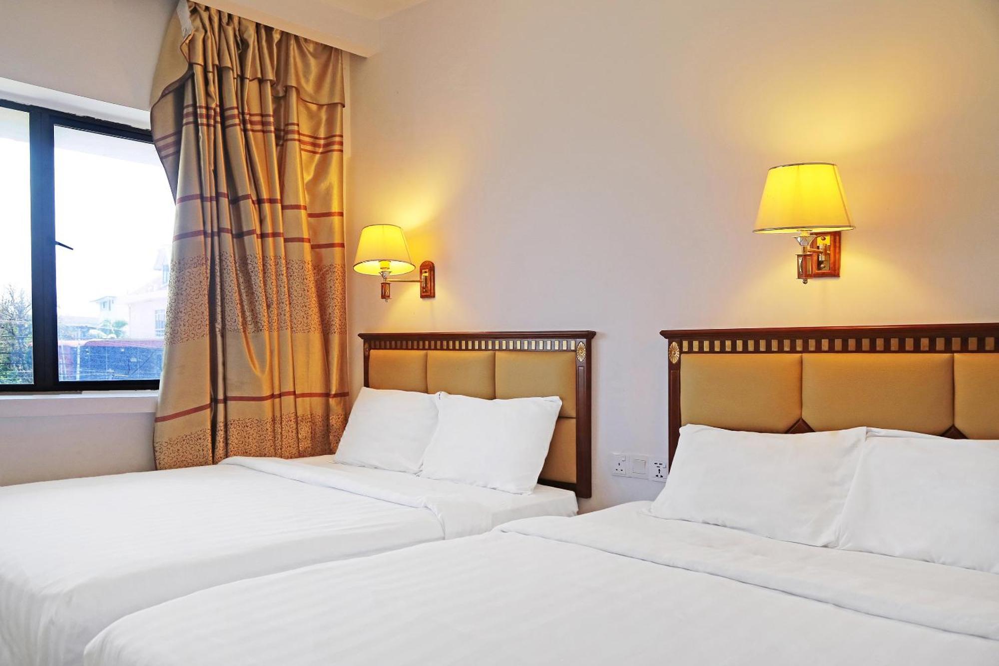 Super Oyo 90464 Borneo Suites Hotel Кота-Кинабалу Экстерьер фото