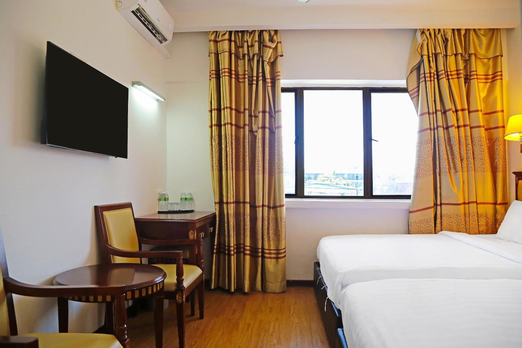 Super Oyo 90464 Borneo Suites Hotel Кота-Кинабалу Экстерьер фото